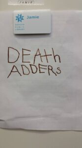 Words "Death Adders" in childish handwriting